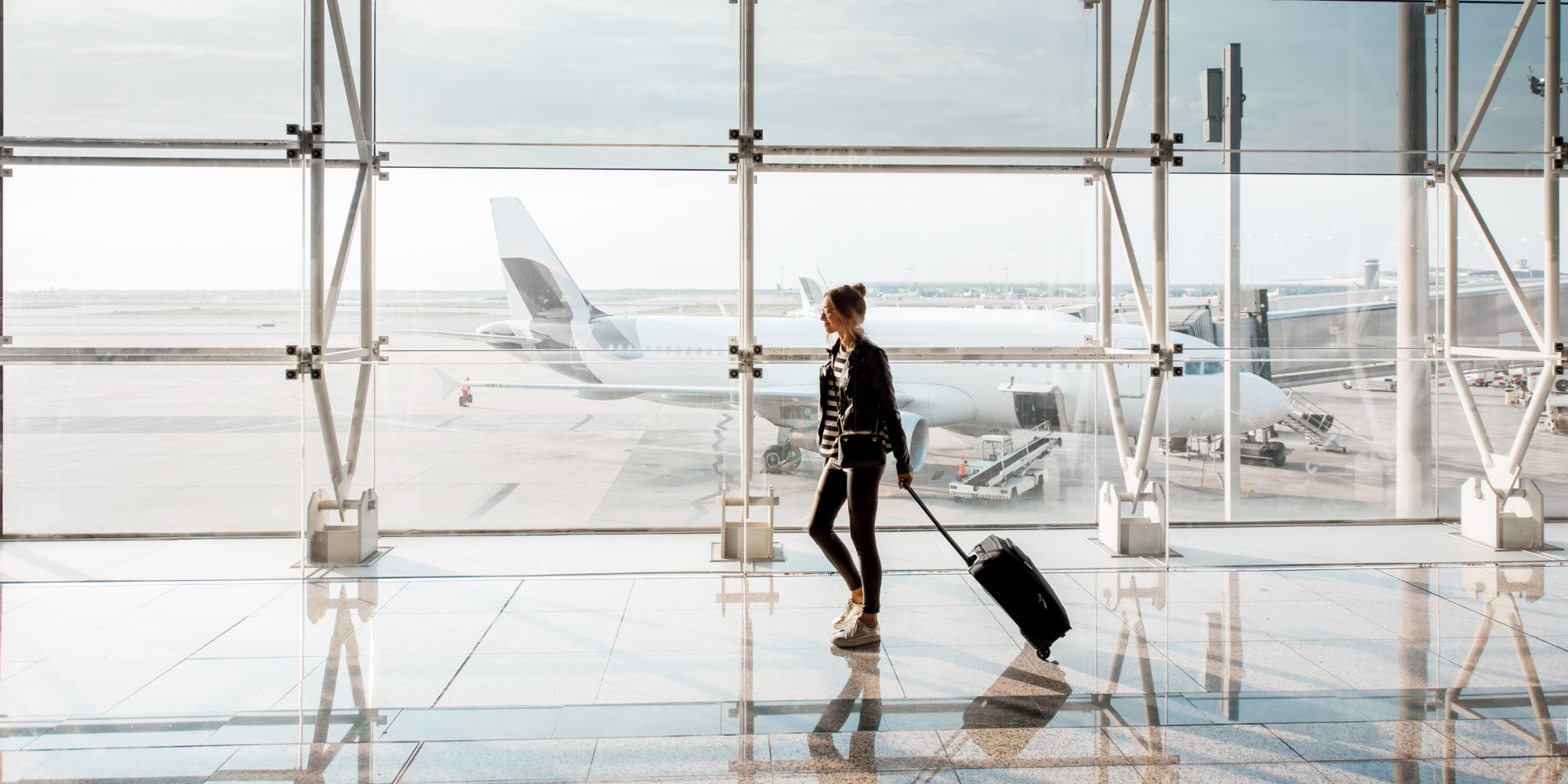 woman traveling through airport
